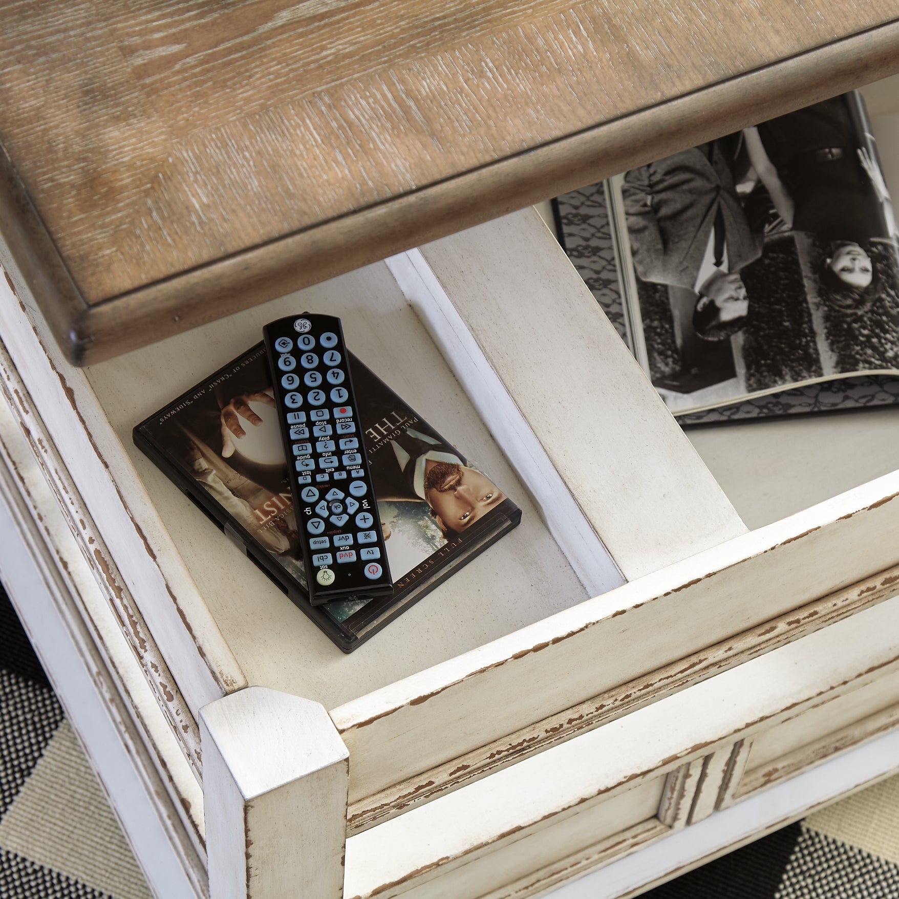 Realyn Lift Top Coffee Table - White/Brown