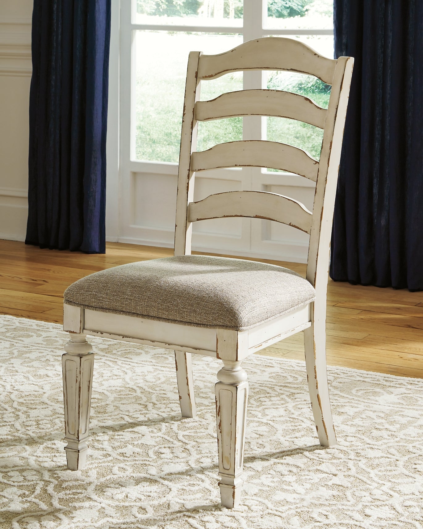 Realyn 9-Pc Dining Set