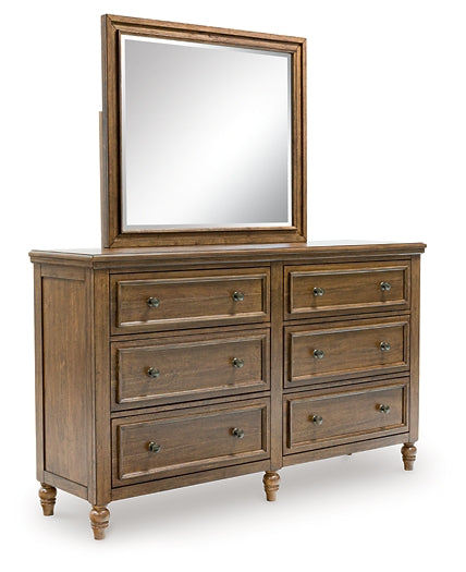 Sturlayne California King Upholstered Panel Bed with Mirrored Dresser