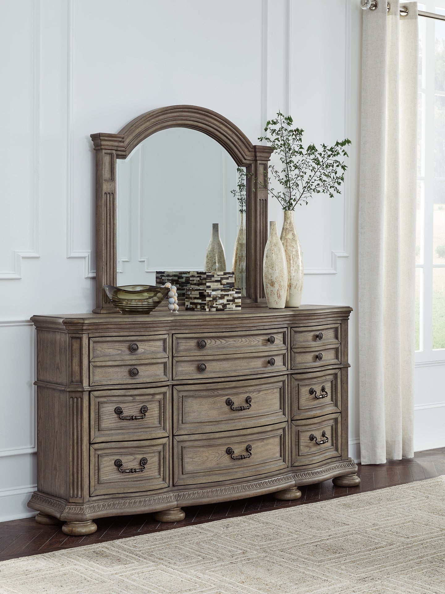 Ardenfield California King Upholstered Sleigh Bed with Mirrored Dresser and Chest
