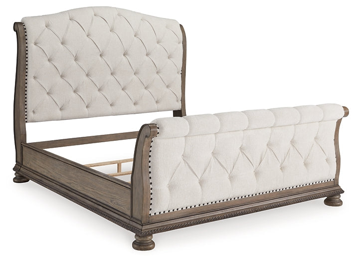 Ardenfield California King Upholstered Sleigh Bed with Mirrored Dresser and Nightstand